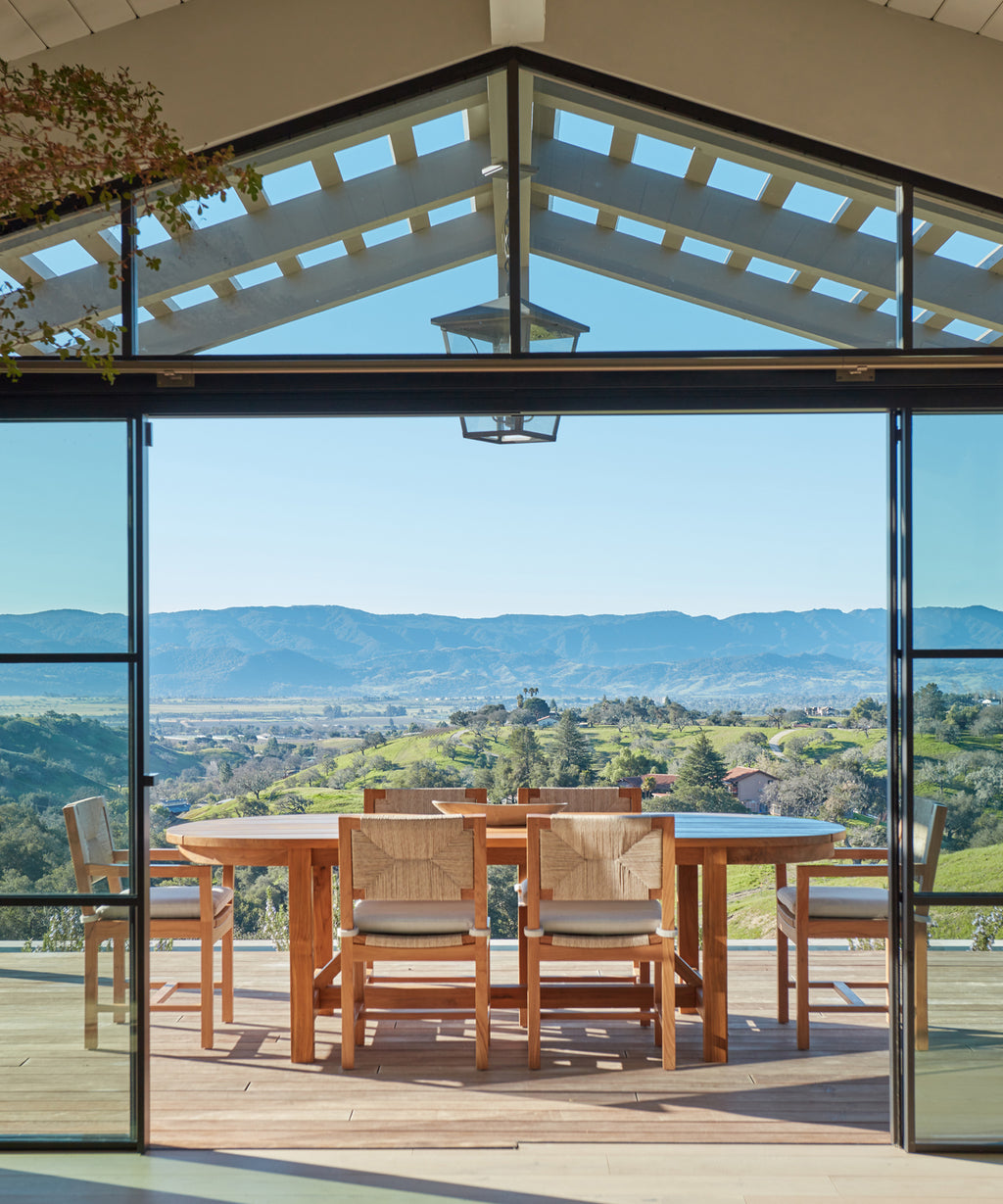 Oval glass outdoor online dining table