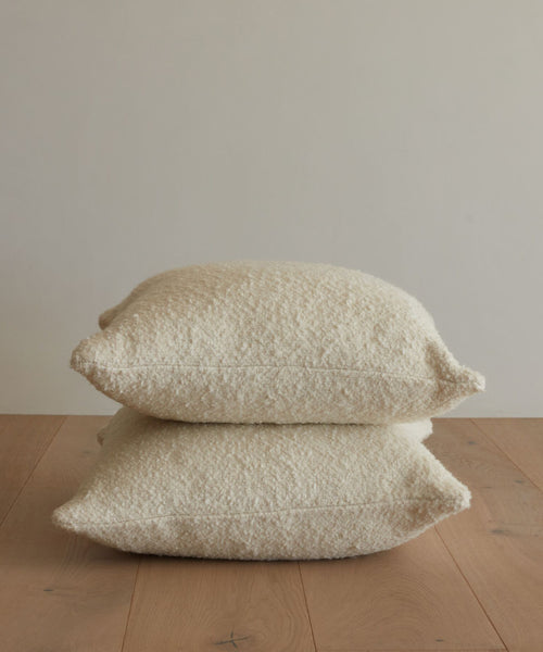 https://www.jennikayne.com/cdn/shop/products/boucle-nell-square-pillows-ivory-1_504x600.jpg?v=1678997444